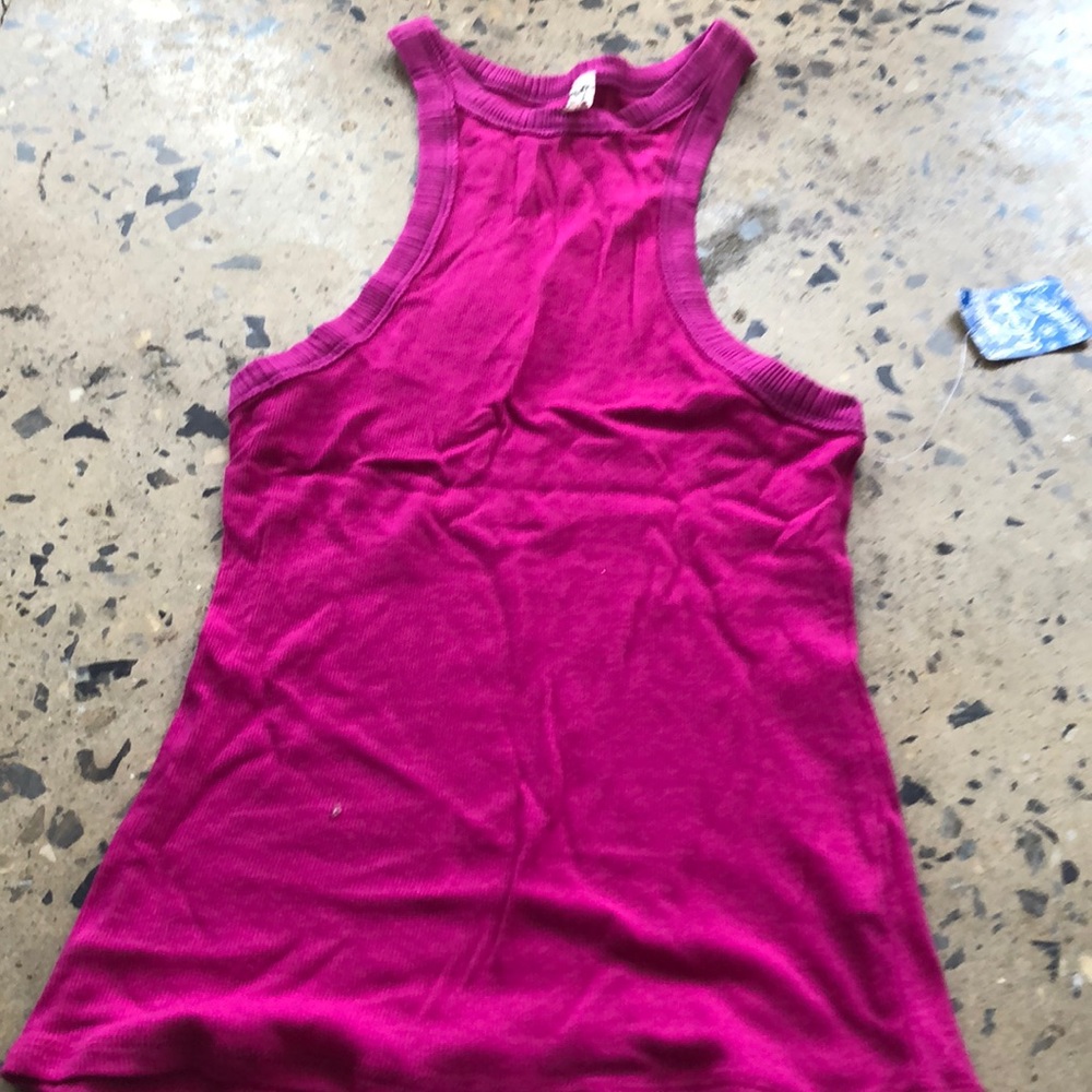 A pink free people tank